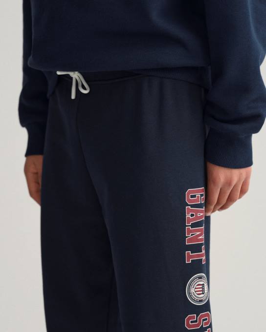 calças de escudo de crista de adolescentes N424C827 noite azul GANT juventude